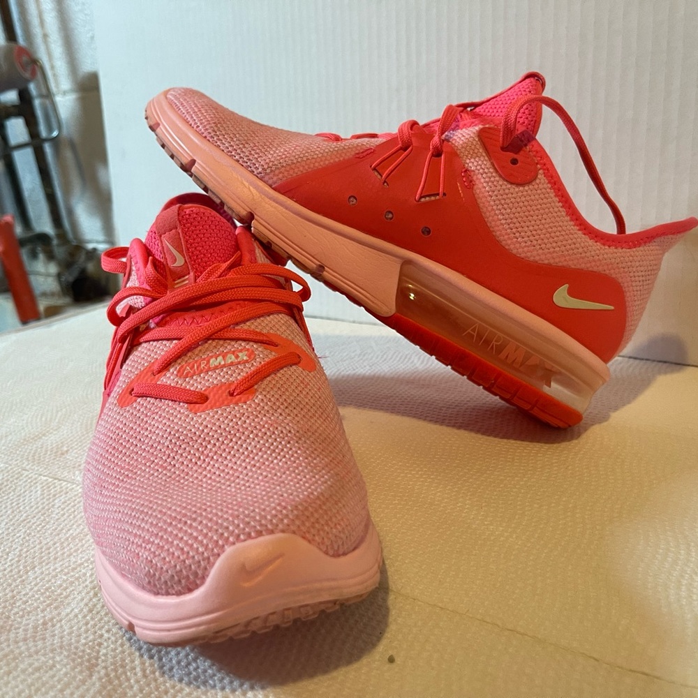 Women’s Nikes, 8 1/2 neon pink.